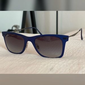 Ray-Ban sunglasses.